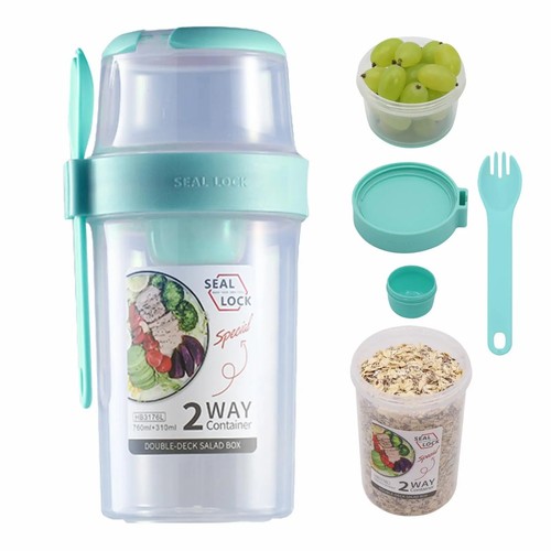 Yoghurt cup with - spoon, fork